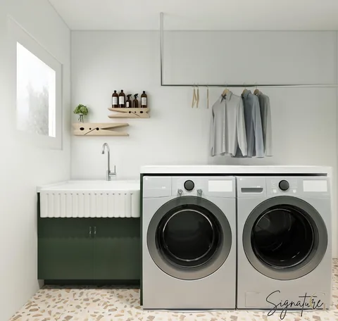 Wash away worries in a green haven, where laundry day feels like a calming retreat.💚 — Laundry